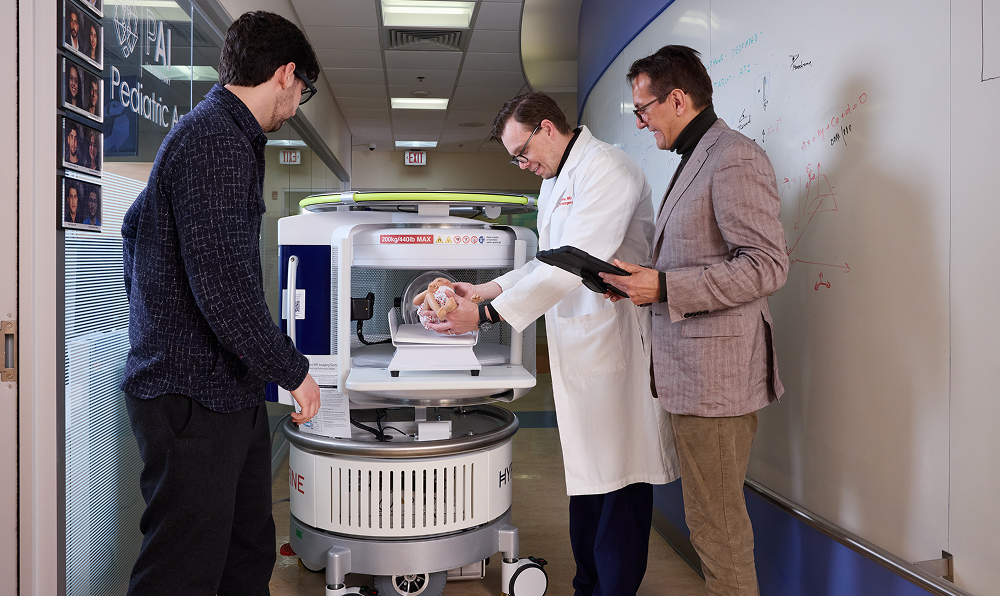 Drs. Marius Linguraru and Daniel Donoho demonstrate the Hyperfine Swoop using babydoll Lilly to walk through the process.