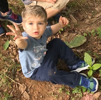 Johan playing in the dirt.