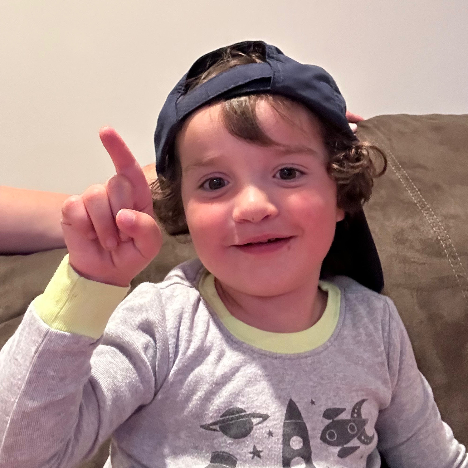 Toddler wearing a hat