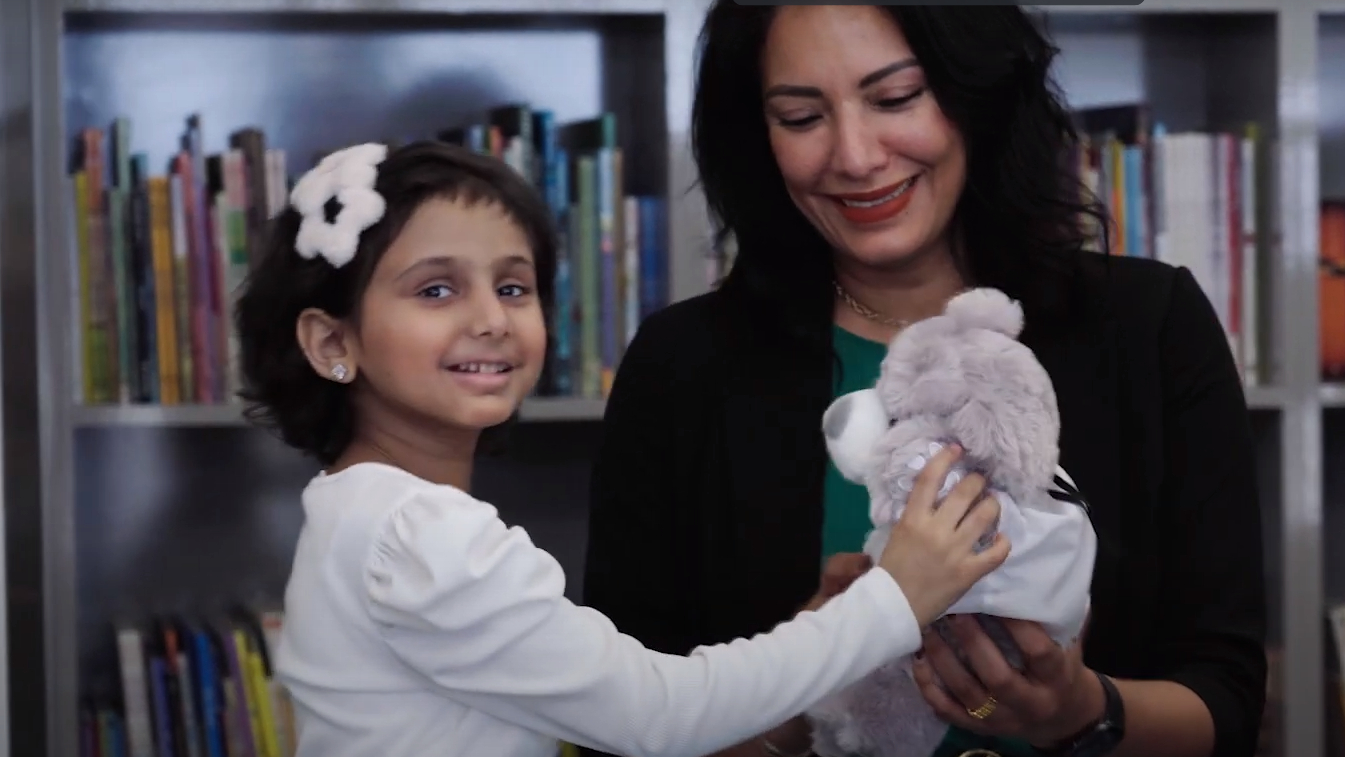 Fouz with her mother and Dr. Bear teddy