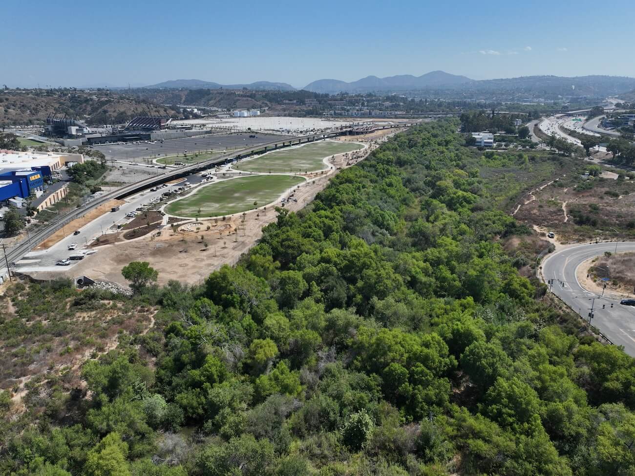 https://edge.sitecorecloud.io/cimicgroupl6308-fdcorpxmclo088b-productioneda2-a2bc/media/project/cimic/flatiron/news/2024/fenton-parkway-bridge-location-and-san-diego-river.jpg?h=974&iar=0&w=1300