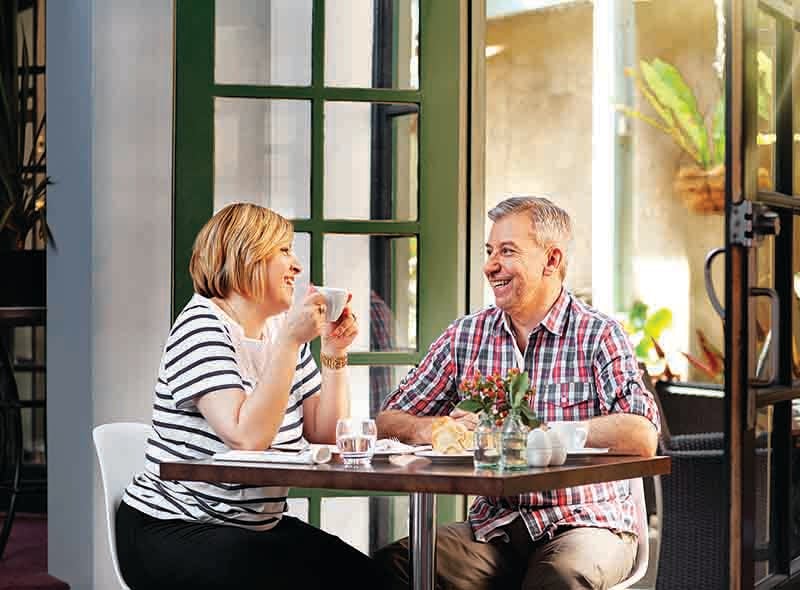 https://edge.sitecorecloud.io/cimicgroupl634d-cimicxmcloud-production-16eb/media/project/cimic/orleanawaters/800-x-590/ow-happy-couple-at-restaurant.jpg?h=590&iar=0&w=800