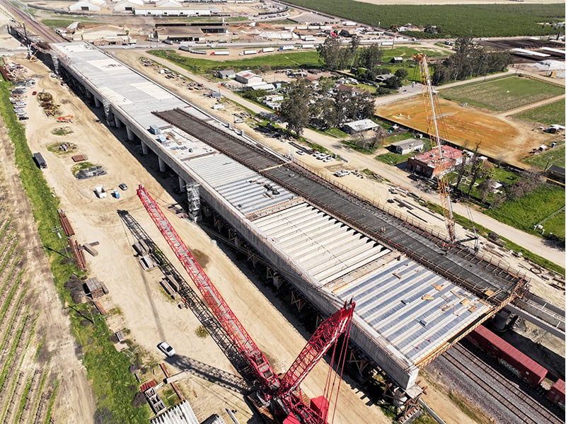 https://edge.sitecorecloud.io/cimicgroupl8739-fdcorpxmclocd75-production769c-7efe/media/project/cimic/flatiron/projects/transit/california-high-speed-rail/800x590/2024-03-15-conejo_viaduct-06-scaled.jpg?h=599&iar=0&w=800