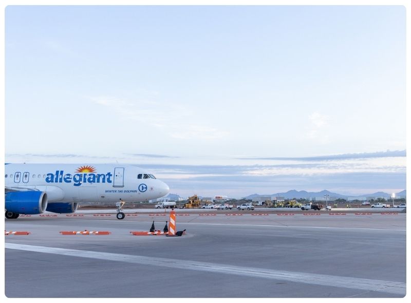An Allegiant plane parked on a runway at Mesa Gateway Airport