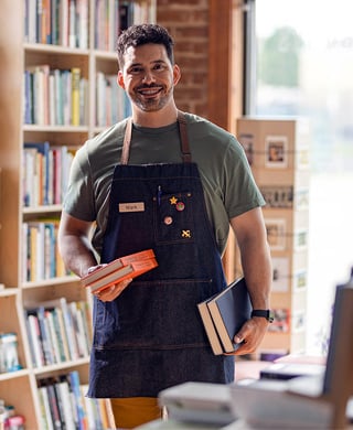 Smiling bookstore owner