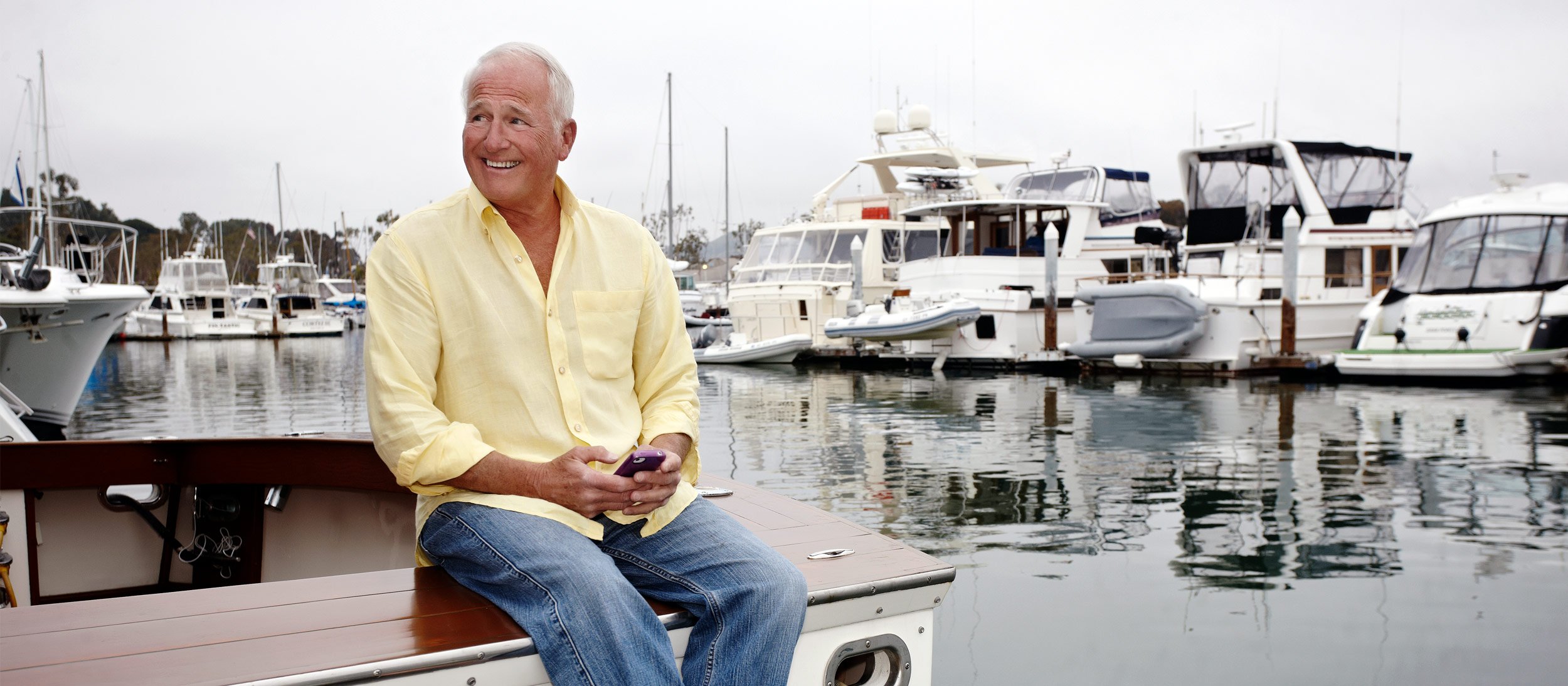 Man enjoying sitting on his boat