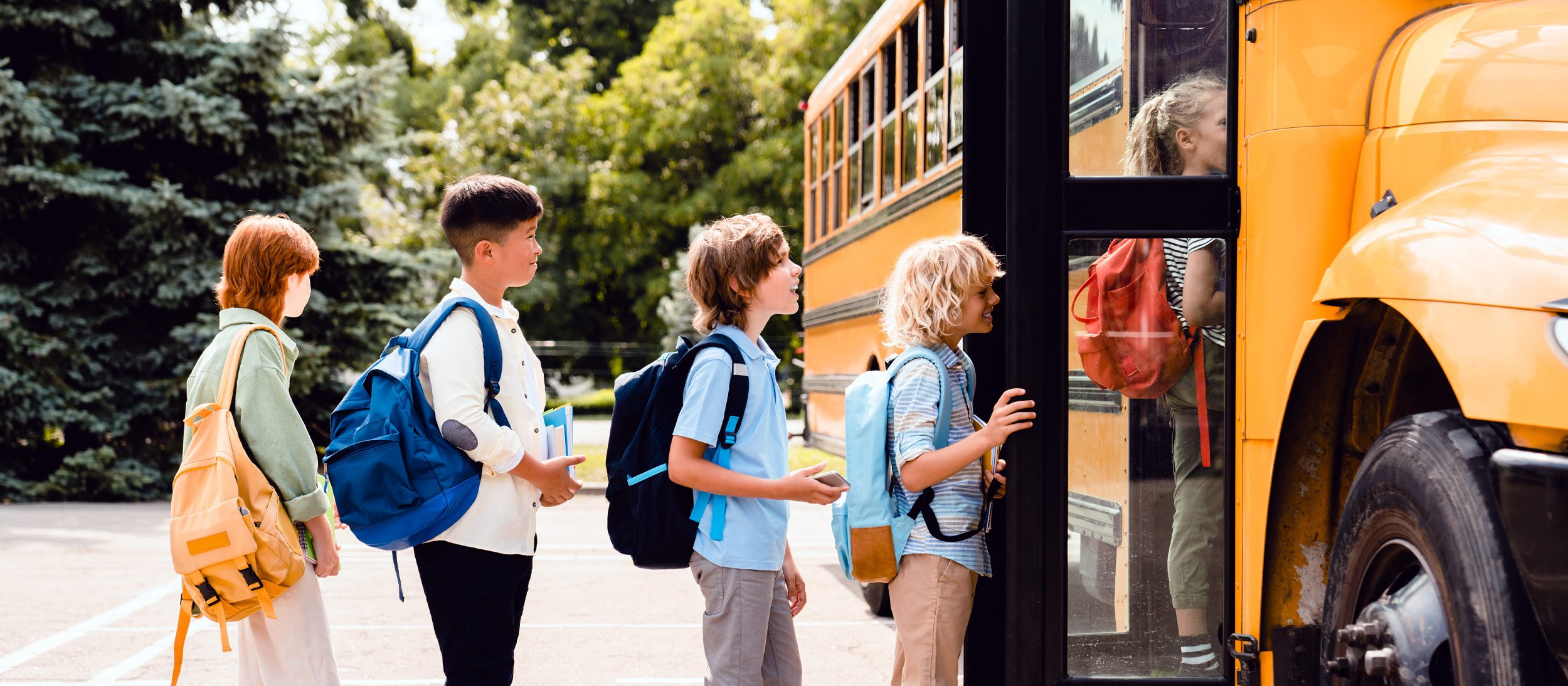 Students in line to get on the bus