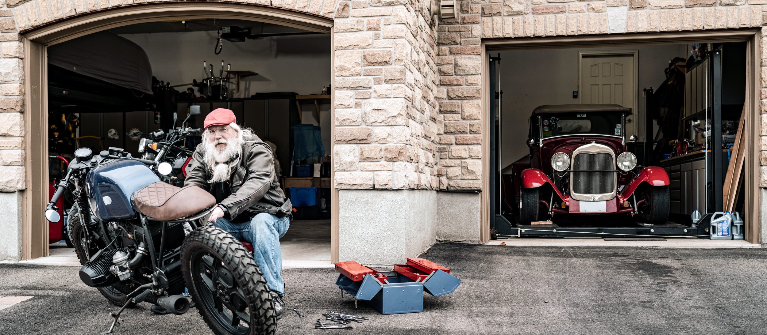 A man maintaining his motorcycle