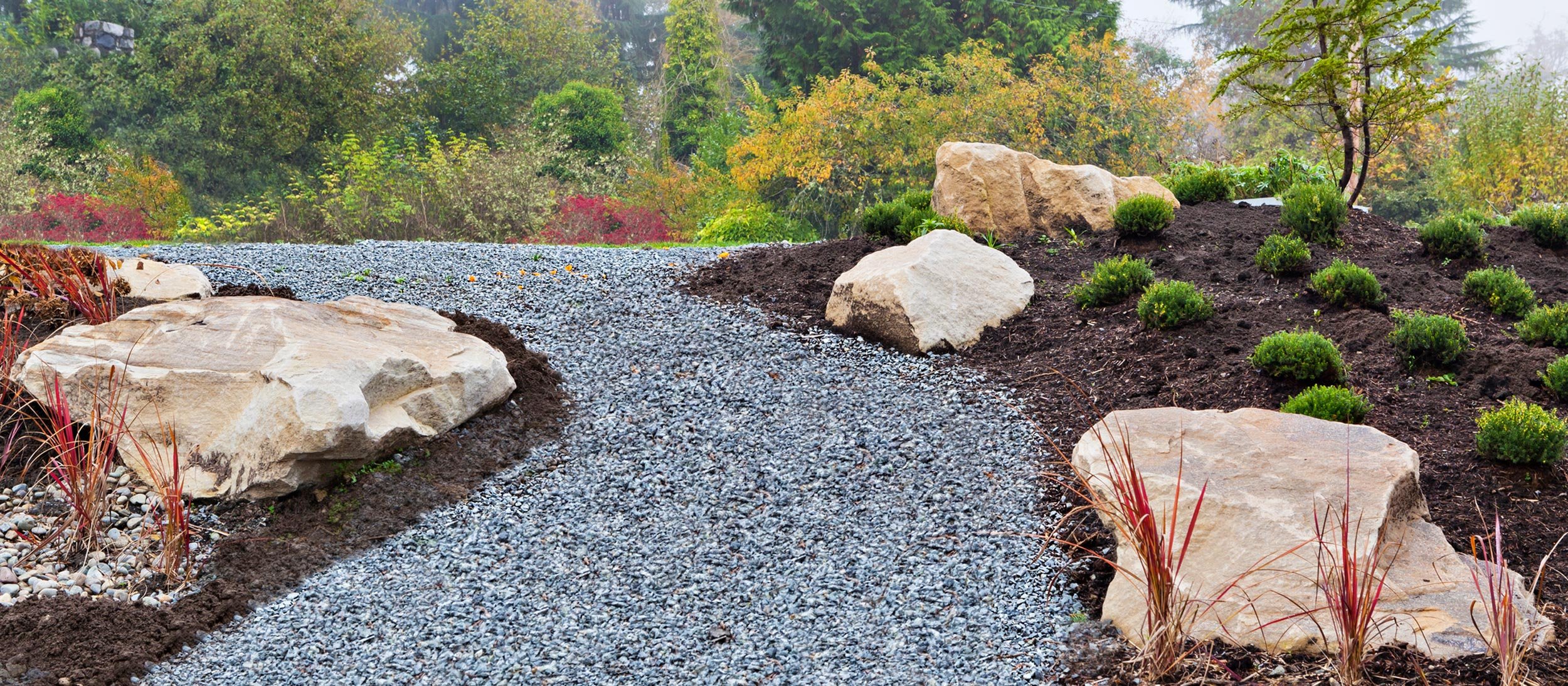 Gravel path between landscaping