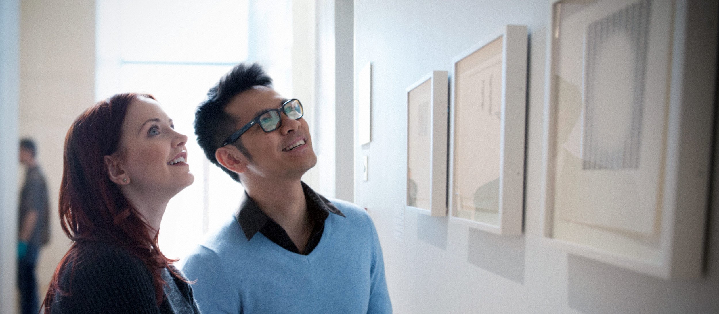 People appreciating art in a gallery