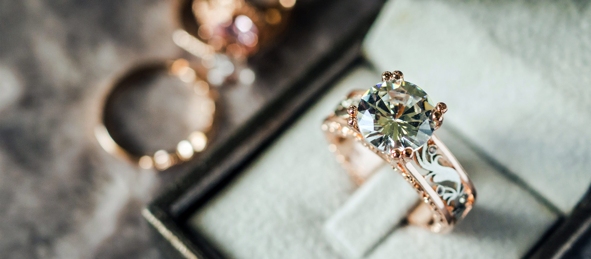 An antique ring displayed in a ring box