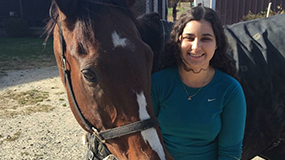 Amira rides a horse