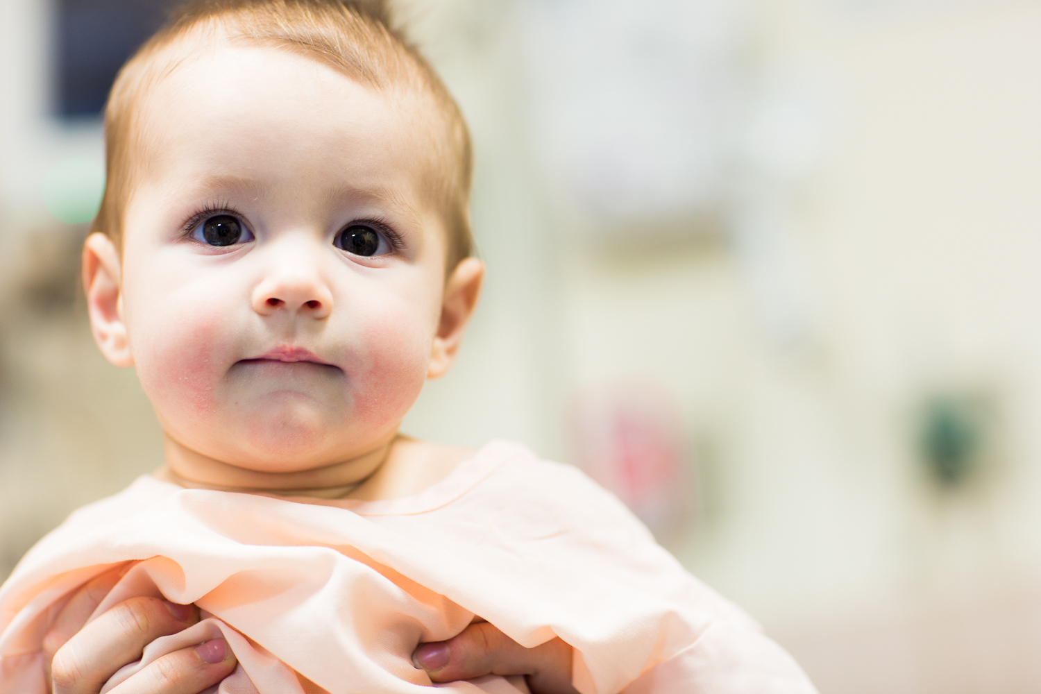 Infant in pink onesie