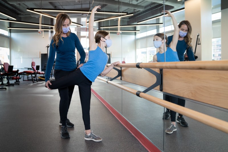 Young girl doing ballet exercises