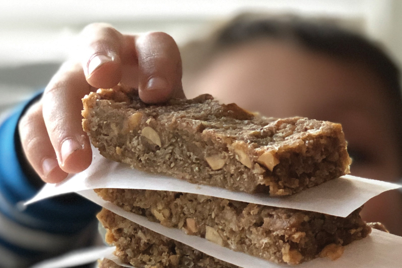 child picking up snack