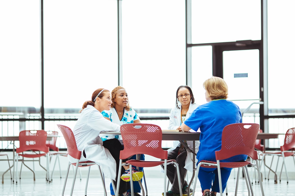 physicians sitting at table