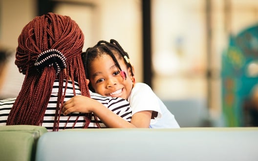 Patient and mother in waiting room