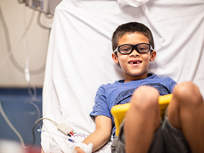 little boy in hospital bed