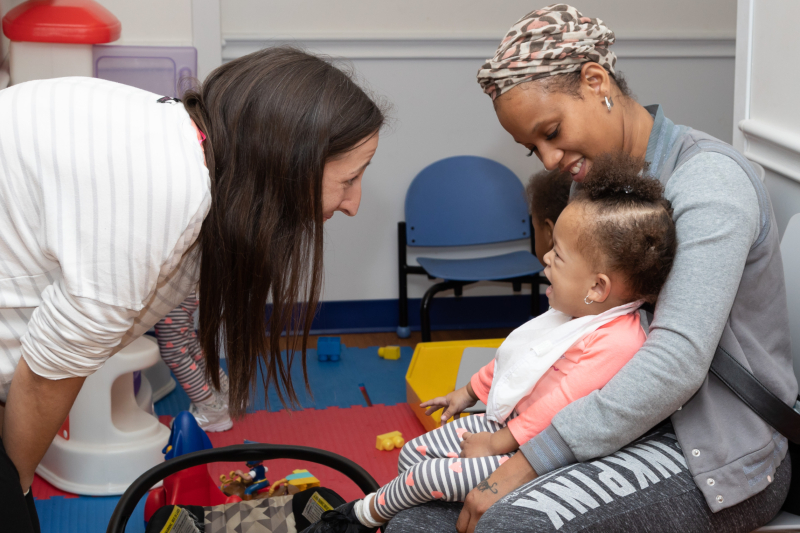 Toddler with mom in exam room