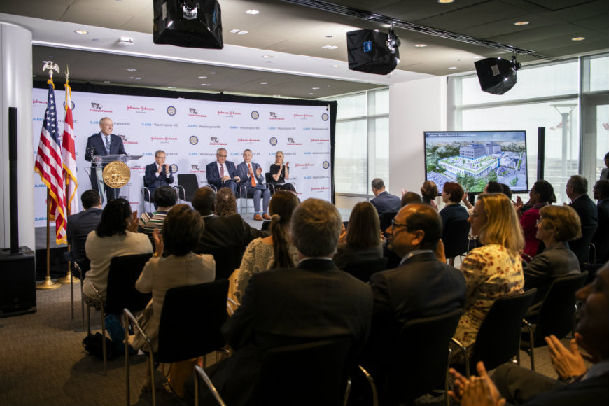 People sitting and listening to speakers at the Children's National - Johnson & Johnson press conference.