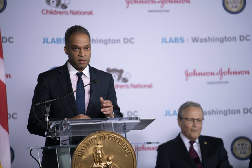 Speaker shares his thoughts at the podium.