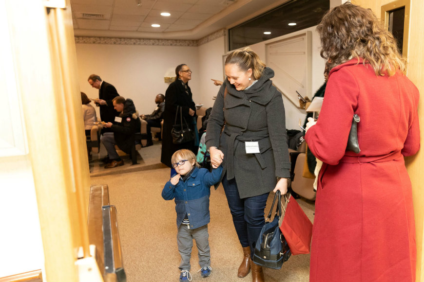 Patients and families stop by for the groundbreaking ceremony speeches.