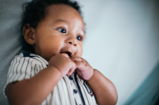 Infant wearing striped shirt
