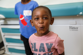 Little boy making silly face