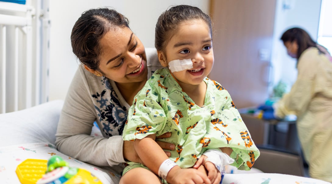 A young female South Asian patient with her mother.