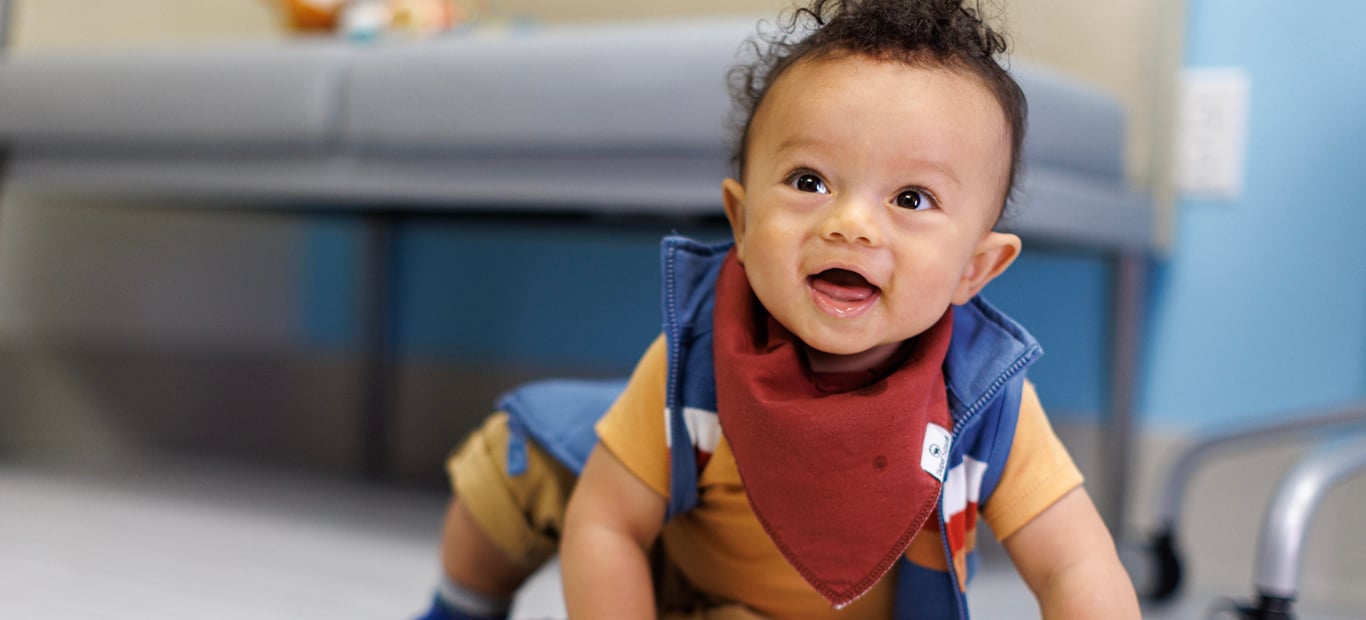 A smiling male infant patient at Children's National Hospital.