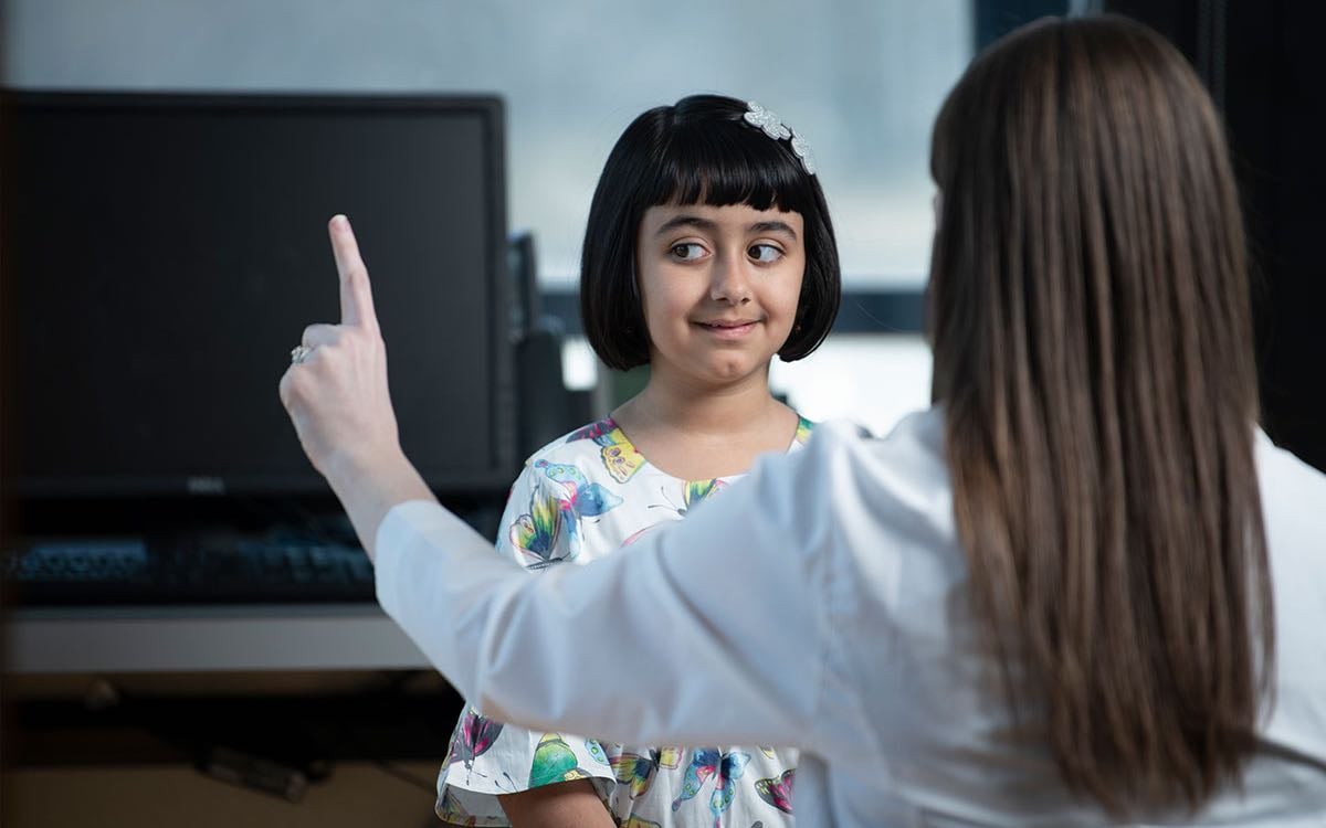 A young patient undergoes a neurological exam.