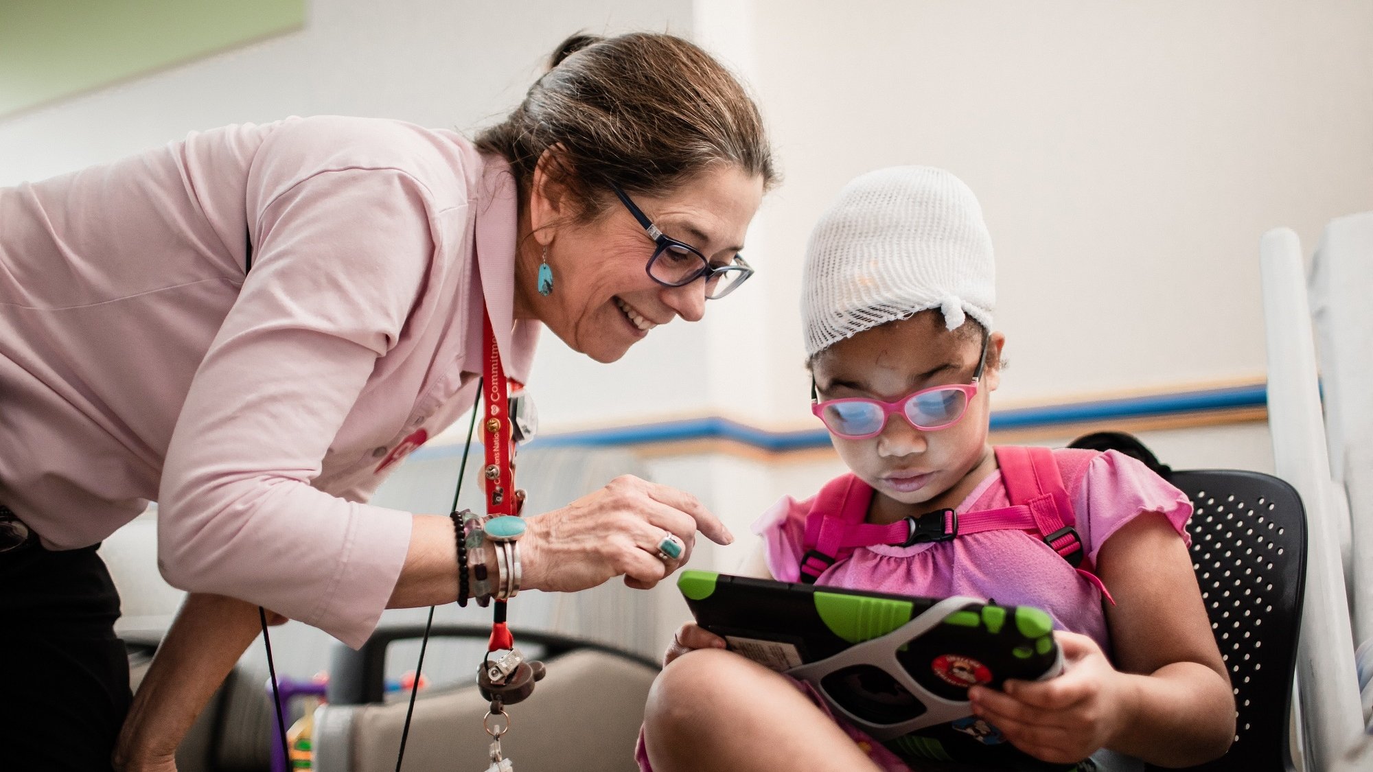 doctor helping EEG patient