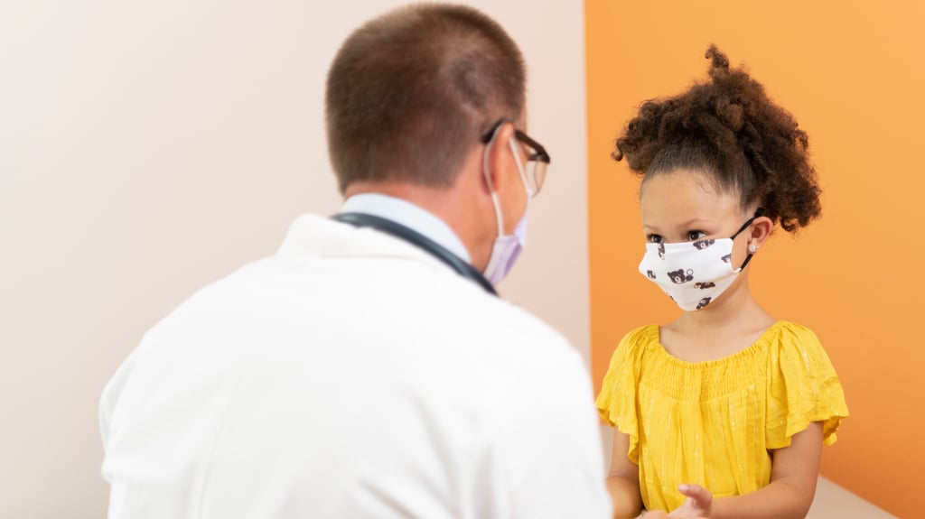 doctor and girl wear masks