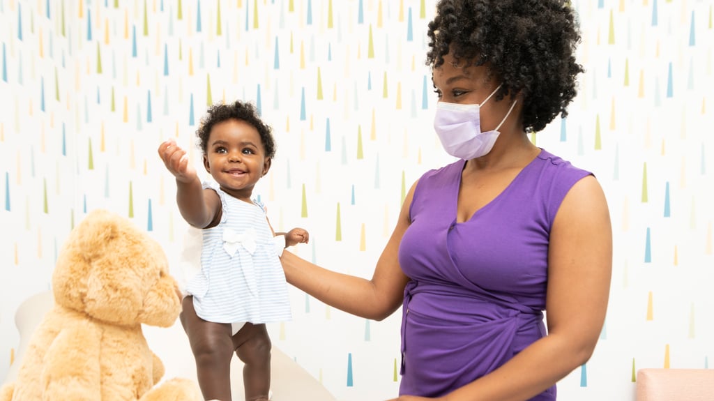 Cute toddler and pediatrician