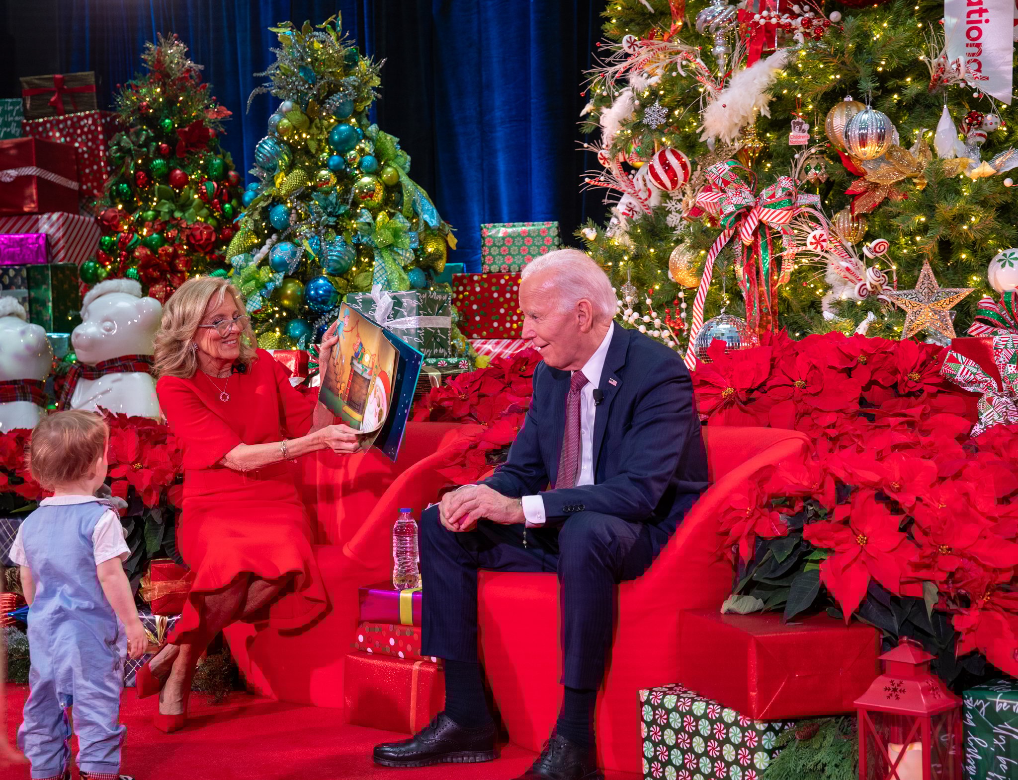 First Lady Jill Biden reads "'Twas the Night Before Christmas" to patients and families at Children's National Hospital while President Joe Biden looks on