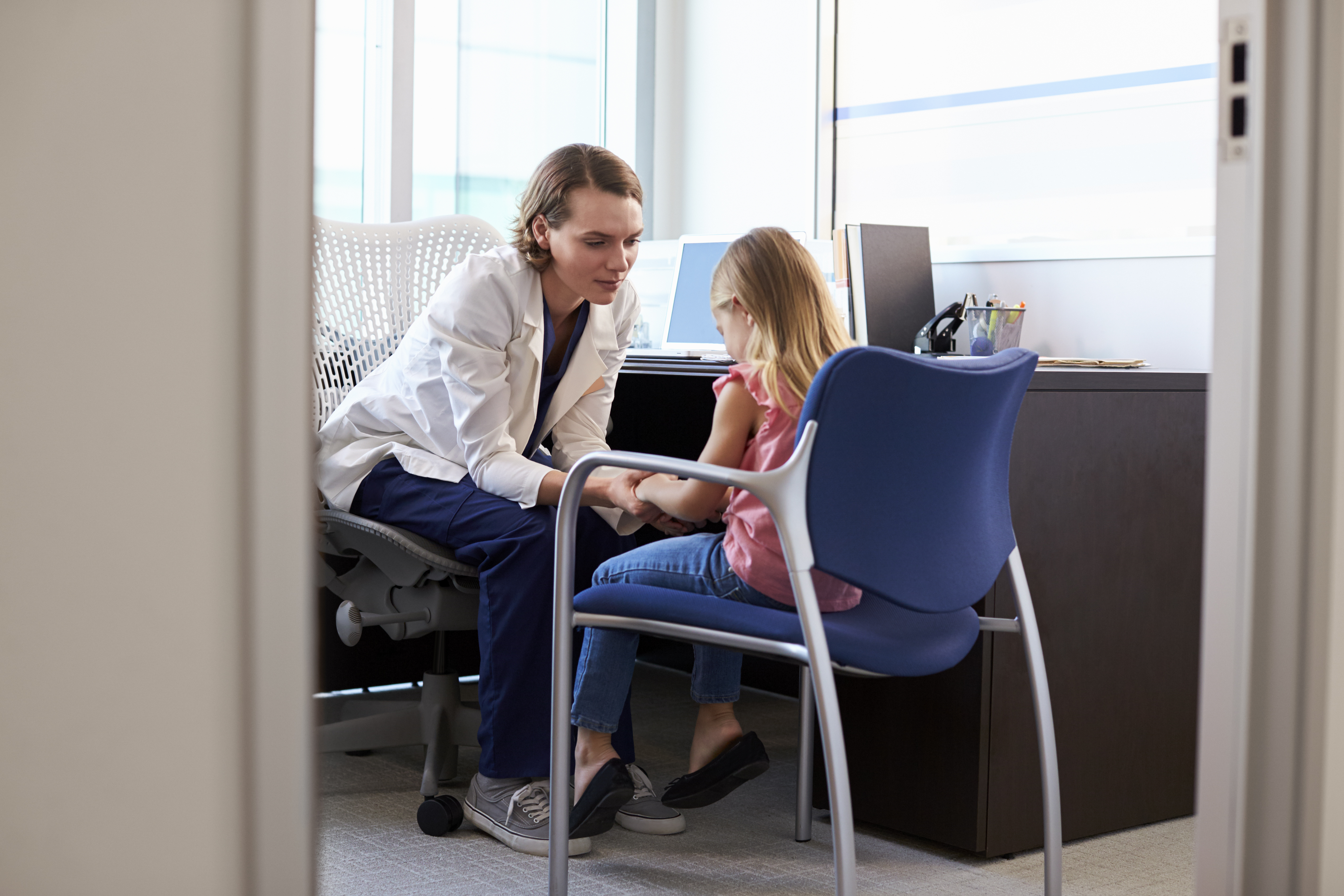 Picture of provider and young patient