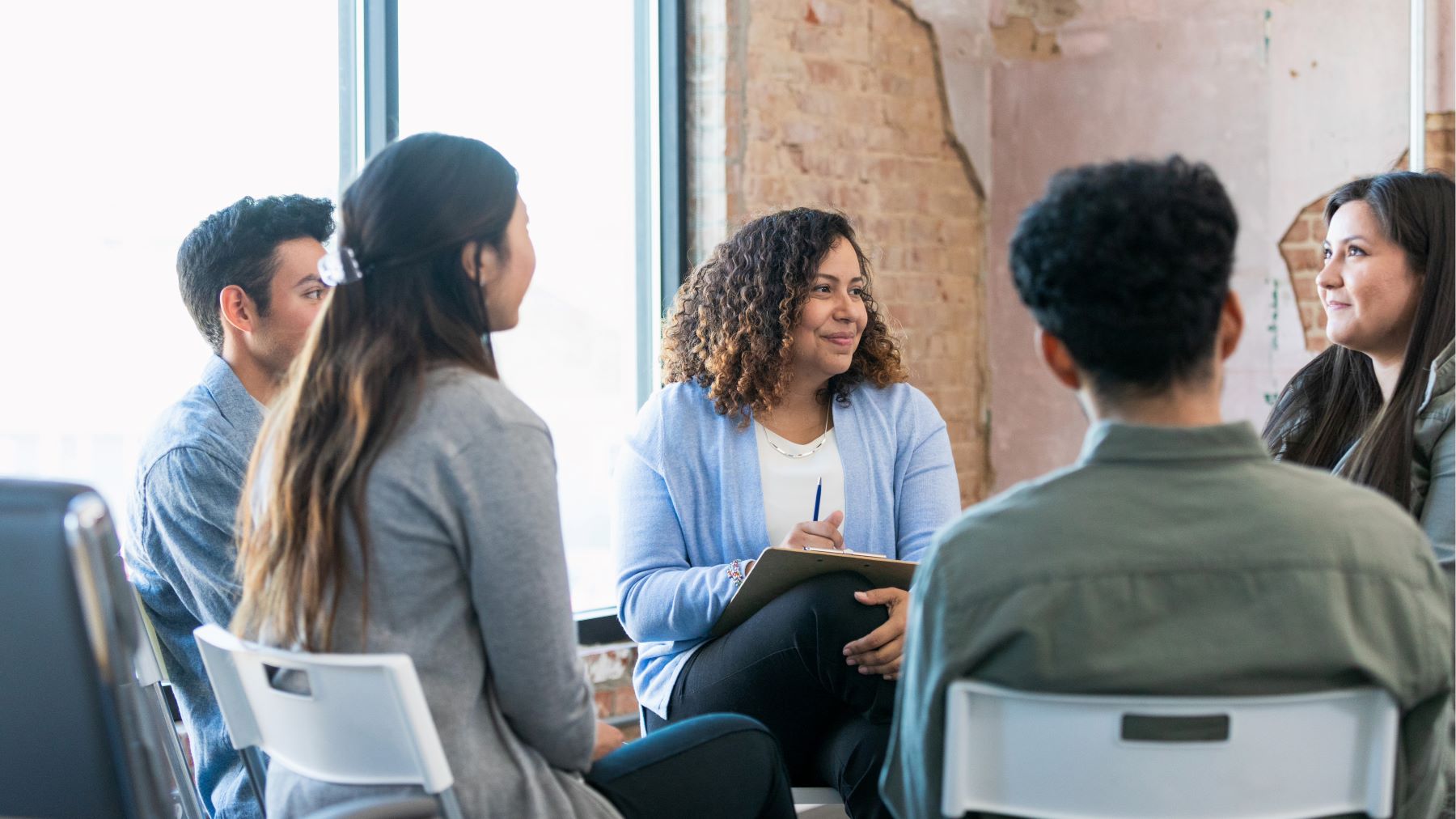 group of therapists sitting in a circle