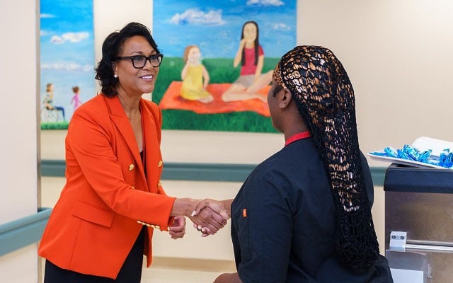 Children's National President and CEO Michelle Riley-Brown greets staff on her first day on the job.