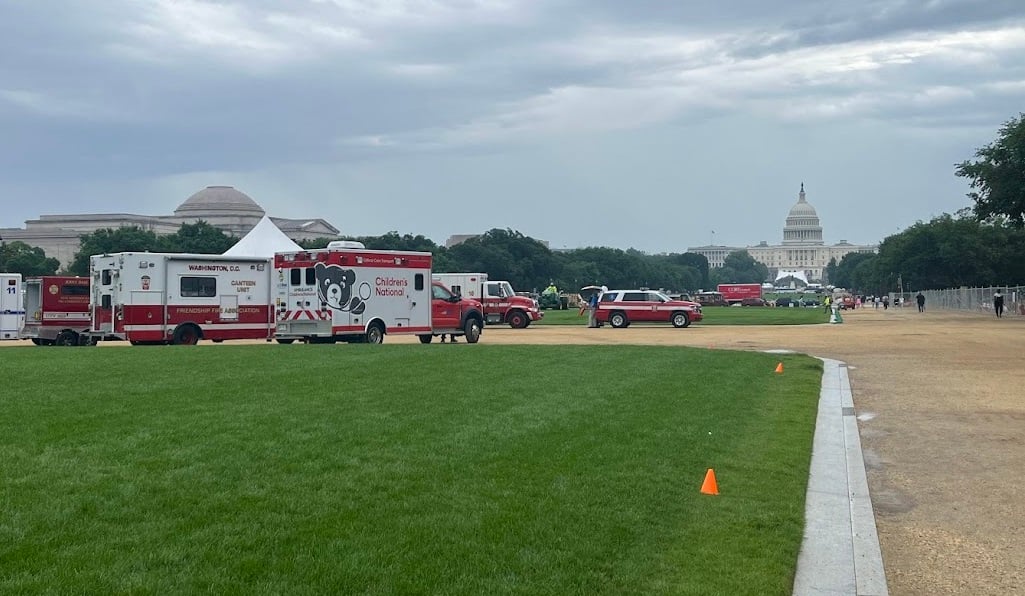 Children's National ambulances parked on the National Mall with the U.S. Capitol in the background