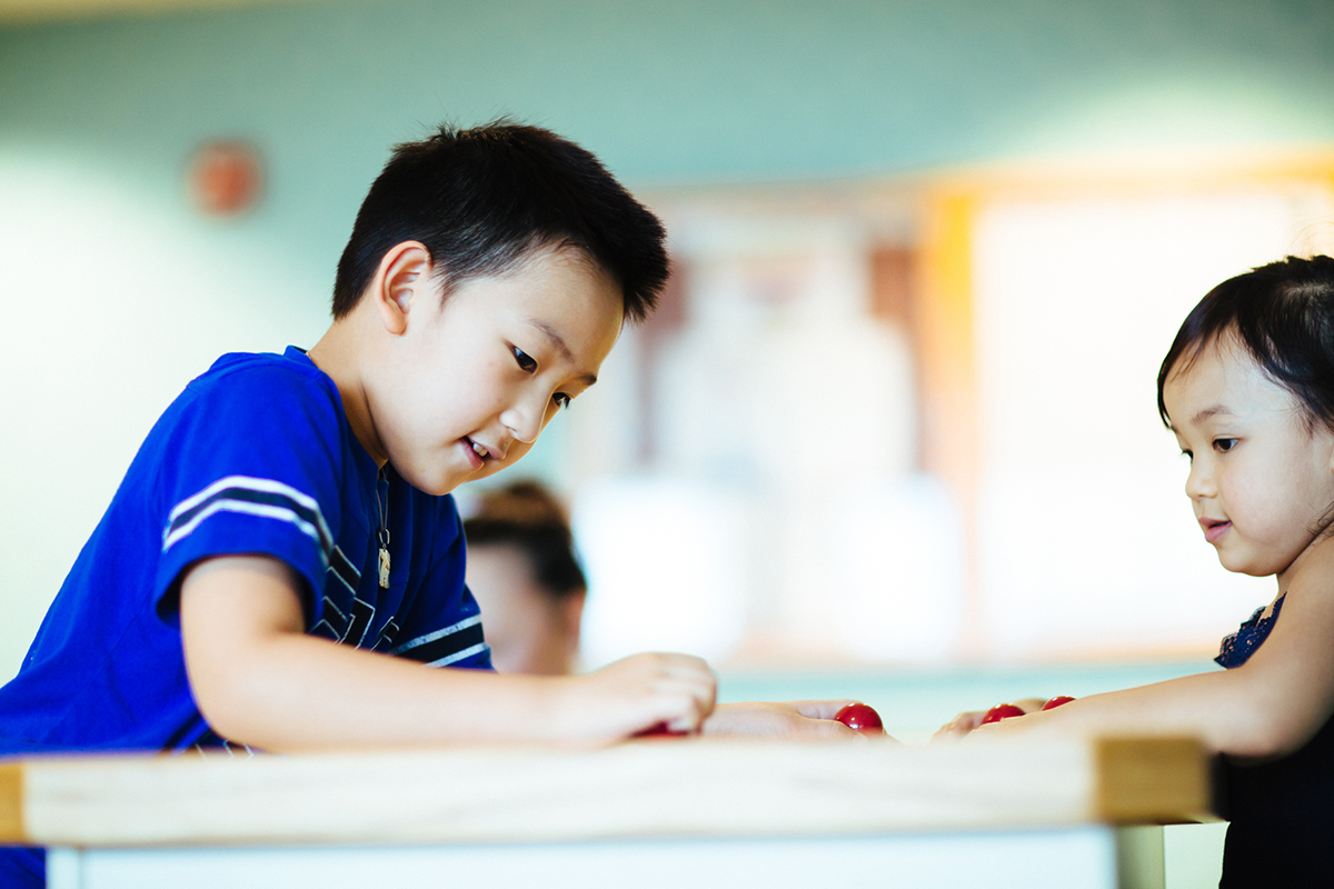 Young boy working at desk