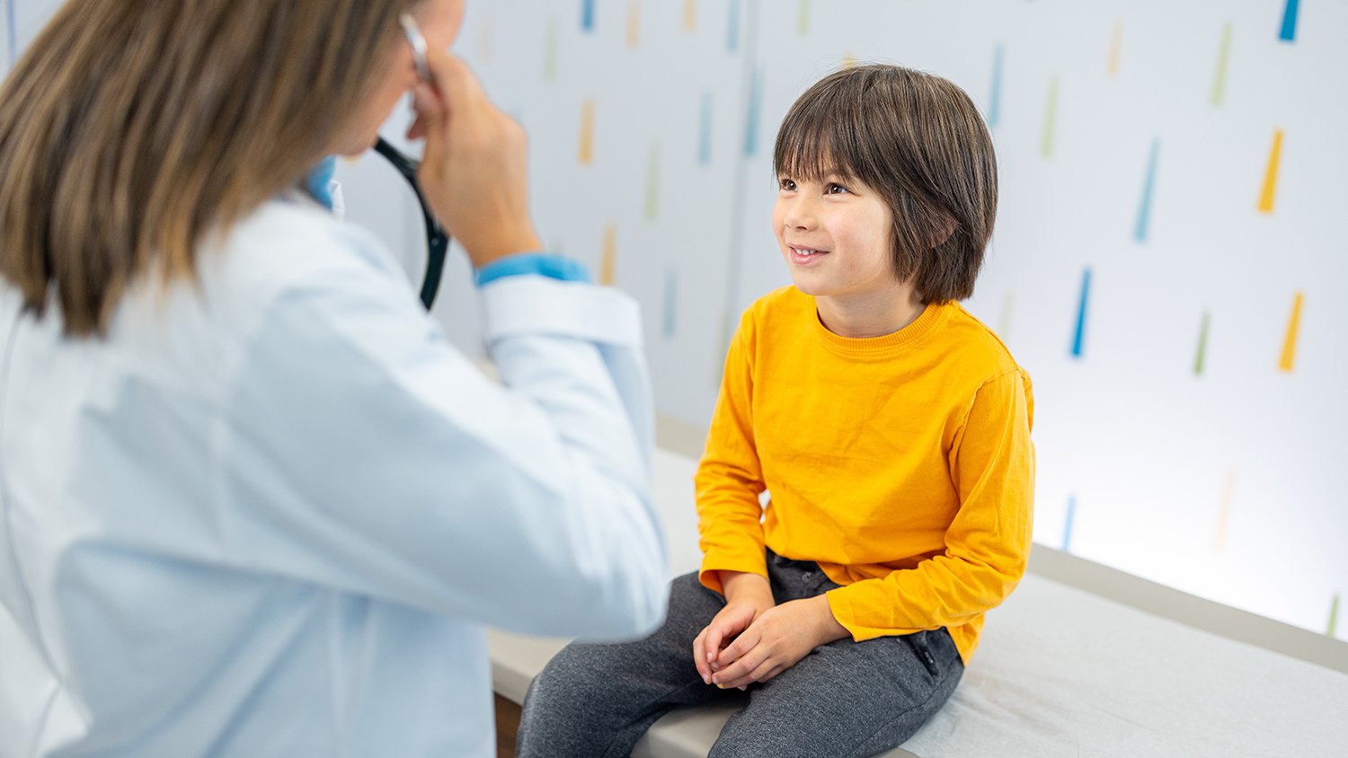 Doctor and patient in exam room