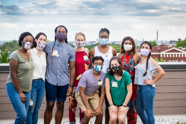 A group photo of training residents all wearing face masks