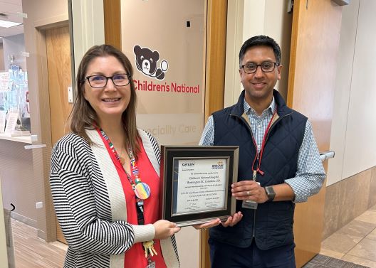 Allergy and Immunology Department receives plaque from ANACARE, an international network of food allergy centers.