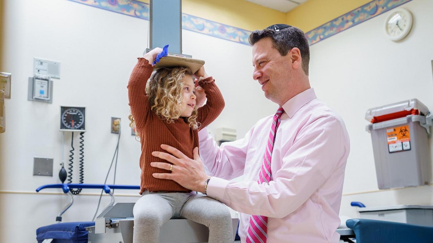 Dr. Dauber and a patient