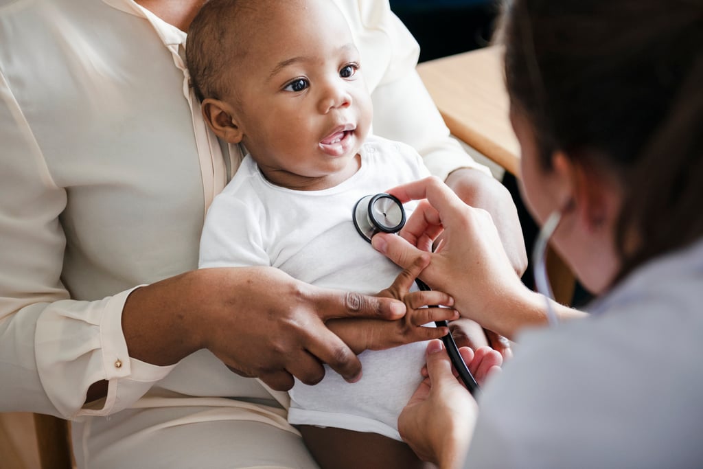 a baby with a stethoscope