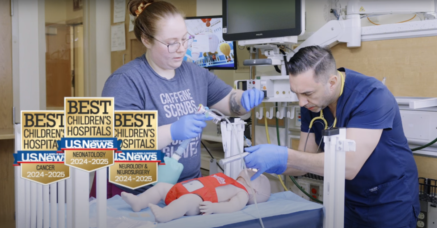 Two respiratory therapists practicing at the hospital