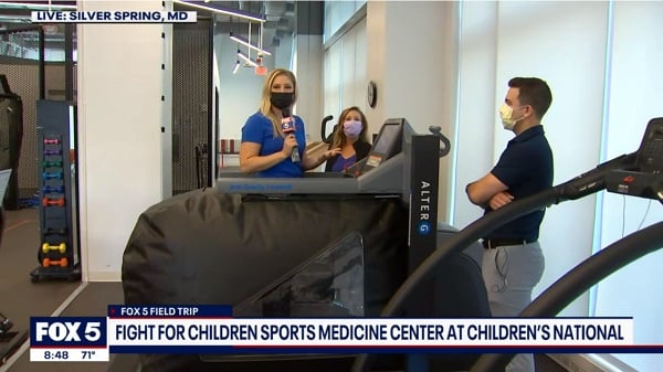 Video screenshot of a visit by Fox5 DC to the physical therapy area of the Fight For Children's Sports Medicine Center. 