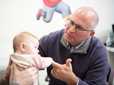 Dr. Marc Levitt with baby