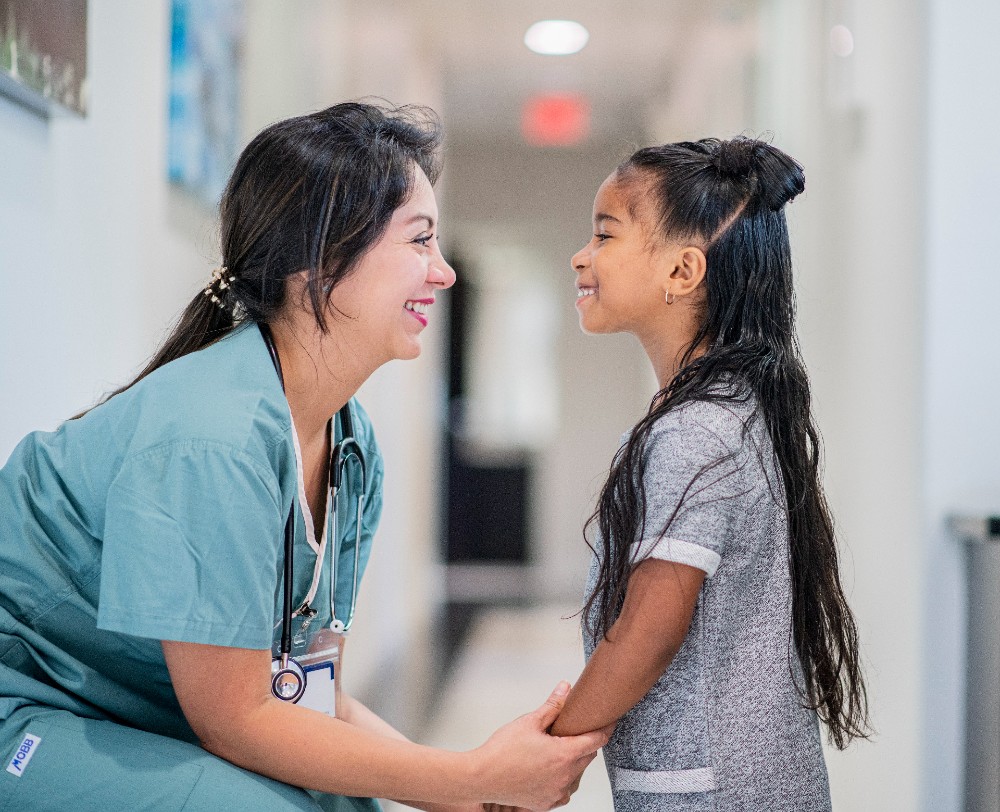 patient young girl with doctor