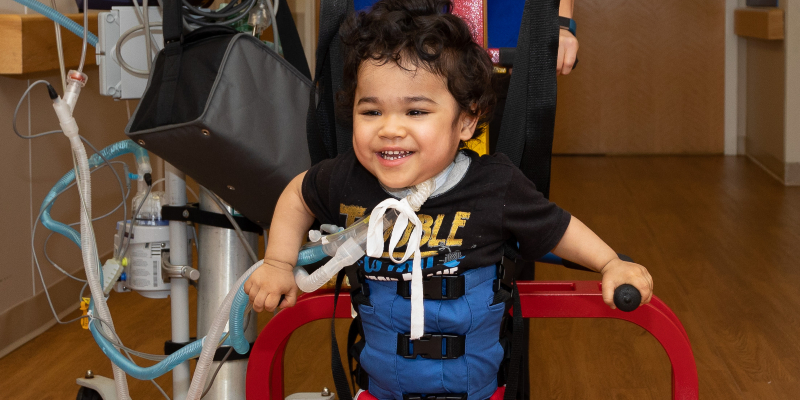 Child using assistive technology